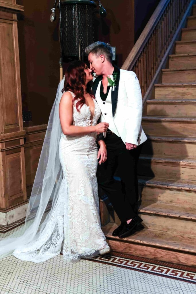 Newlywed couple kissing at Room With a View wedding venue in Nashville.