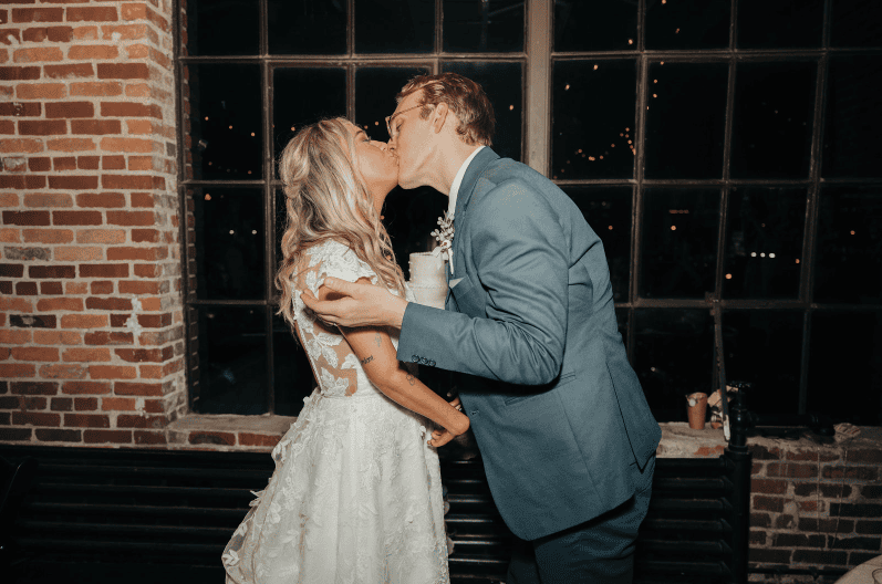 Newlywed couple kissing at Room With a View wedding venue in Nashville