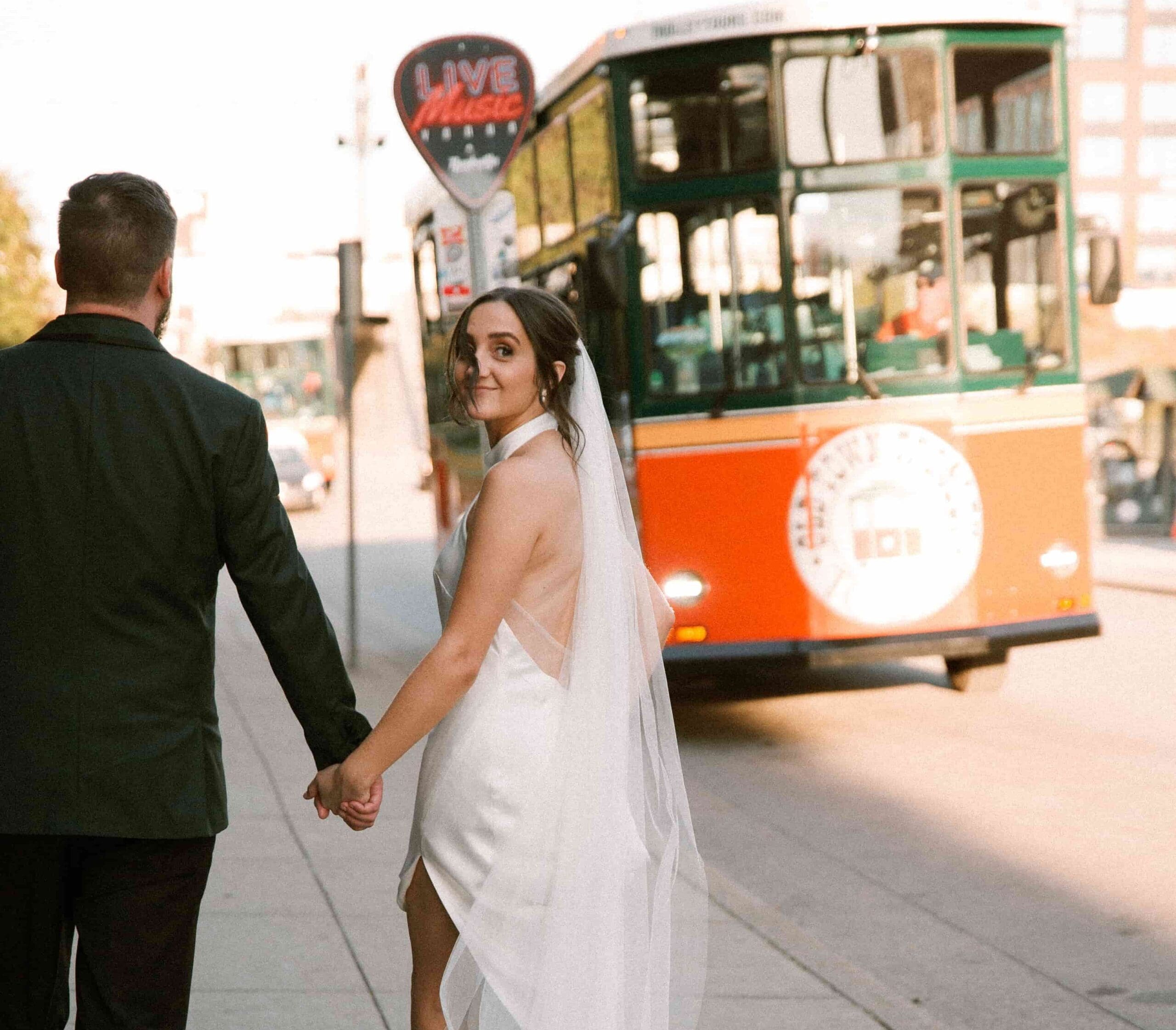 Couple walking outside at Nashville wedding venue Room With A View.