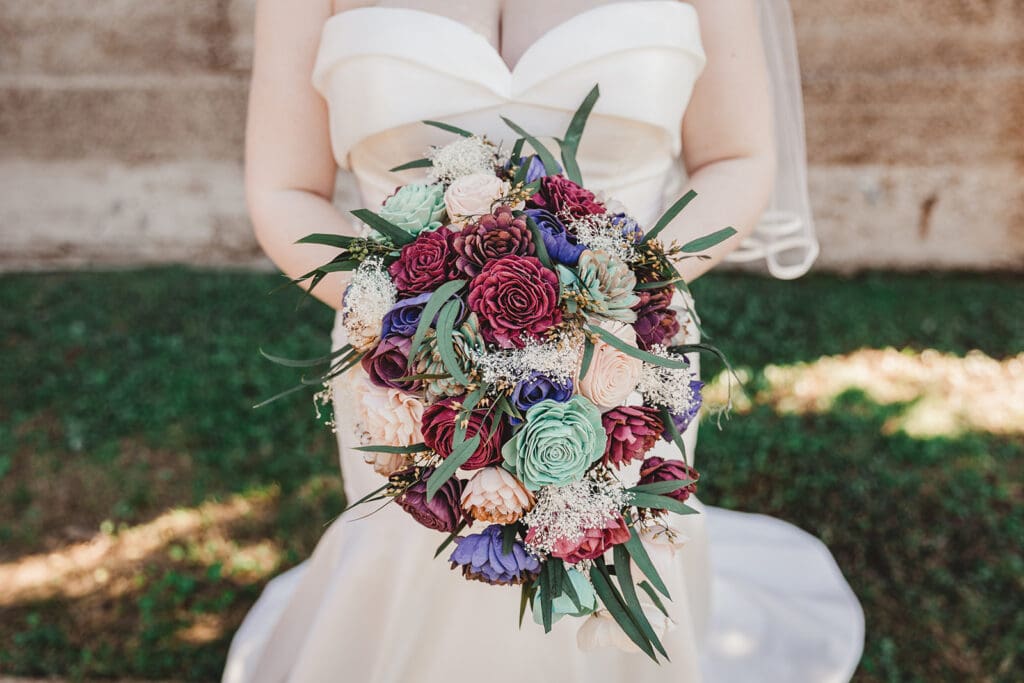 Floral arrangement and bride at Nashville wedding venue Room With A View