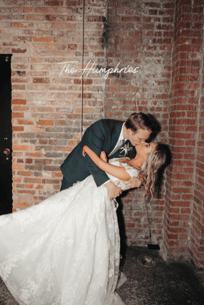 Newlywed couple kissing at Room With a View wedding venue in Nashville.
