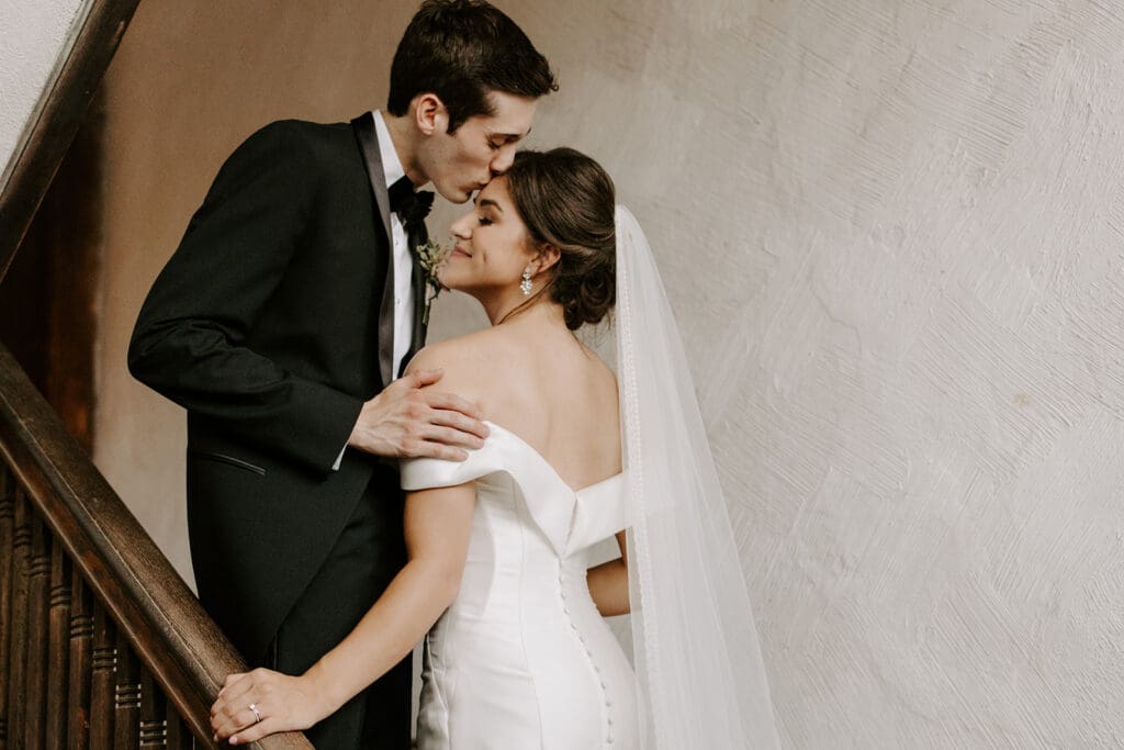 Newlywed couple forehead kiss at Room With a View wedding venue in Nashville